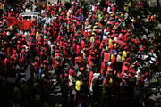 Workers march in Johannesburg, South Africa, on Sept. South Africa's biggest union group held marches nationwide to protest what it alleges is chronic corruption fueled by President Jacob Zuma and a prominent family of businessmen, reflecting public anger over a scandal that has ensnared several international companies. (AP Photo/Themba Hadebe)
