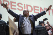 Presidential candidate Andres Manuel Lopez Obrador acknowledges his supporters as he arrives to Mexico City's main square, the Zocalo on July 1, 2018. (AP Photo/Anthony Vazquez)