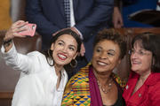 Rep. Alexandria Ocasio-Cortez, a freshman Democrat from New York, takes a selfie with Democratic Representatives Ann McLane Kuster of New Hampshire and Barbara Lee of California on the first day of the 116th Congress on Jan. 3. Ms. Ocasio-Cortez is one of 28 new Catholic members of Congress. (AP Photo/J. Scott Applewhite)