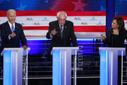 Democratic presidential candidate former vice president Joe Biden, left, Sen. Bernie Sanders, I-Vt., and Sen. Kamala Harris, D-Calif., all talk at the same time during the Democratic primary debate hosted by NBC News at the Adrienne Arsht Center for the Performing Arts, Thursday, June 27, 2019, in Miami. (AP Photo/Wilfredo Lee)