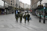 In this March 26, 2020, photo, Serbian army soldiers patrol Belgrade’s main pedestrian street as part of the government’s efforts to contain the coronavirus pandemic. (AP Photo/Darko Vojinovic)