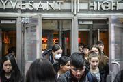 Students at New York City's Stuyvesant High School leave classes on March 13. Schools in New York City have since been closed for the rest of the academic year. (AP Photo/Bebeto Matthews, File)