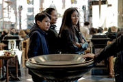 A Latin American family gathers at Notre Dame aux Riches Claires in Brussels. Photo by Melissa Vida.