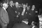 After a fierce battle for the presidential nomination in June 1932, Al Smith shakes hands with Gov. Franklin D. Roosevelt at the state Democratic convention in Albany, N.Y., Oct. 4, 1932. (AP photo)