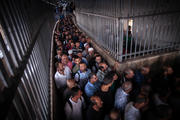 People cross into Jerusalem from the West Bank through Checkpoint 300 (CNS photo/courtesy Sean Hawkey, World Council of Churches).