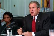 President George W. Bush addresses the media at the Pentagon on Sept. 17, 2001, following a meeting with his national security team and leaders of the National Guard and Reserve forces. Seated at the left is National Security Advisor Condoleezza Rice.