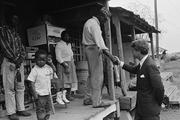 Sen. Robert F. Kennedy meets a resident of Greenville, Miss., in April 1967. (AP Photo/Jack Thornell)