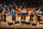 The St. Louis Jesuits at their final concert, on Sept. 29 at Powell Hall in St. Louis. From left, Tim Manion, John Foley, S.J., Bob Dufford, S.J., Dan Schutte and Roc O'Connor, S.J. (Don Doll, S.J.)