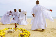 Evangelical Christians pray together on Bar Beach in Lagos, Nigeria September 28, 2003. (Getty Images)