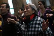 Worshippers pray during a Dec. 4 Mass in the Cathedral of the Immaculate Conception in Beijing. (CNS photo/How Hwee Young, EPA)