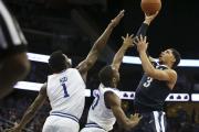 Villanova's Josh Hart (3) takes a shot past Seton Hall defenders Michael Nzei, (1) of Nigeria, and Khadeen Carrington (0) during the second half of an NCAA college basketball game, Saturday, Feb. 18, 2017, in Newark, N.J. Villanova won 92-70. (AP Photo/Mel Evans)