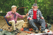 ROAD WARRIORS. Robert Redford and Nick Nolte on the Appalachian Trail in “A Walk in the Woods.”