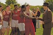 FOR THE WIN. Stephan James, center, as Jesse Owens and Jason Sudeikis, right, as Larry Snyder in “Race”