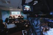 ALL TOGETHER NOW. Catholic officials at a news conference in Washington D.C. to discuss initiatives for bringing together laypeople and religious.