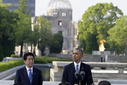 U.S. President Barack Obama delivers remarks, accompanied by Japanese Prime Minister Shinzo Abe at Hiroshima Peace Memorial Park in Hiroshima, western Japan. (AP Photo/Carolyn Kaster)