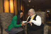 AMONG FRIENDS. Tia Clifford, left, and Linda Lee Jackson, O.P., celebrate National Catholic Sisters Week at St. Catherine University in St. Paul, Minn., in March.