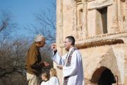 TAKE THIS. Sean Carroll, S.J., gives Communion during Mass at Tumacacori National Historical Park in Tumacacori, Ariz., Jan. 10.