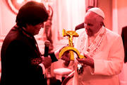 Bolivian President Evo Morales presents a gift to Pope Francis at the government palace in La Paz, Bolivia, July 8. The gift was a wooden hammer and sickle -- the symbol of communism -- with a figure of the crucified Christ. (CNS photo/L'Osservatore Romano/Illustration: America Media)