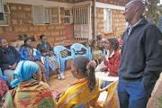 ROUNDTABLE: Stephen Nzioki, S.J., speaks with women being counseled and medically treated for H.I.V. through a Catholic program in Nairobi, Kenya. 