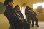 BE OPENED. Women rest in a church during ear acupuncture.