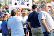 LIVE FREE. Protesters at a tax day Tea Party rally at the Washington monument.