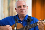 Deacon leads music during 2013 encuentro in St. Augustine, Fla. (CNS photo/Tom Tracy)