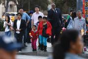 PROMISES TO KEEP. People stand at an intersection in Koreatown, one of several neighborhoods designated by the Obama administration as a promise zone in Los Angeles, Calif., Jan. 22, 2014.