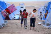 Refugees flee Mosul, set up camp near Irbil (CNS photo/Stringer, EPA) (June 13, 2014)