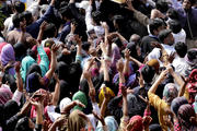 Pakistani Christians carry a coffin of a church bombing victim in Lahore, Pakistan, March 17. 