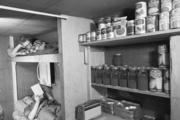 A home fallout shelter near Akron, Mich., captured by an unknown photographer in 1960. (National Archives and Records Administration, Records of the Defense Civil Preparedness Agency/(397-MA-2s-160)/[VENDOR # 125])