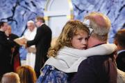 LOVE IN ACTION. A father holds his daughter at the Festival of Families with Pope Francis in Philadelphia on Sept. 26. 