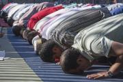 GOD IS GREATER. Muslims celebrating Eid al-Fitr, which marks the end of the month of Ramadan, in Madrid, Spain.