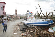 AFTERMATH: A police boat washed into Tacloban City by Typhoon Haiyan