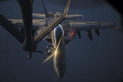 AIR BORNE. A U.S. fighter jet refueling over northern Iraq on Aug. 21. 