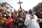 PERSECUTED COMMUNITY. Pakistani Christians at a protest rally in 2013 to condemn a suicide attack on All Saints Church in Peshawar.