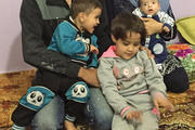 FAMILY PORTRAIT. Mouhammad Amin El Oujali with his wife, Zafira El Aquad, and their three children.