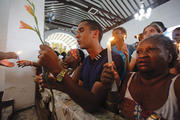At prayer in Cuba