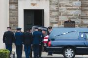 Soldiers carry the casket of Beau Biden.