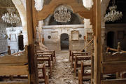Debris seen inside damaged church in Syria. (CNS photo/Khaled al-Ha riri, Reuters) 