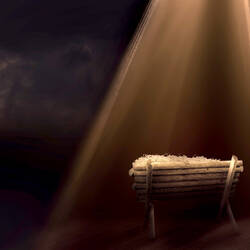 In a dark room, a wooden manger sits in a beam of light pouring through a window