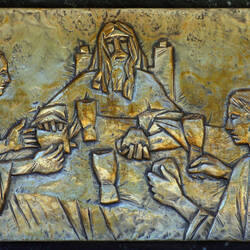 Supper at Emmaus. Jesus and two disciples sit around the table and share a meal.