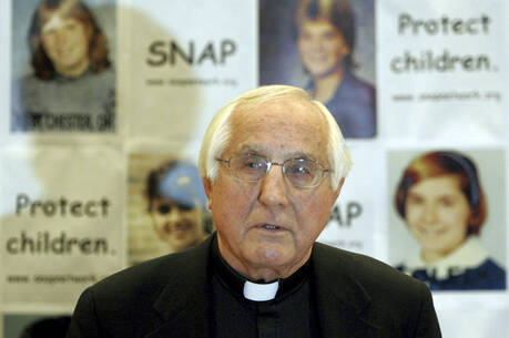 Auxiliary Bishop Thomas Gumbleton speaks on Jan. 11, 2006, at a press conference in Columbus, Ohio. Gumbleton, a Catholic bishop in Detroit who for decades was an international voice against war and racism and an advocate for labor and social justice, died Thursday, April 4, 2024. He was 94. (AP Photo/Kiichiro Sato, File)