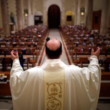 Father Giancarlo Ruggieri celebrates a livestreamed Easter Mass in San Giorgio Ionico, Italy, on April 12, 2020. (CNS photo/Alessandro Garofalo, Reuters)