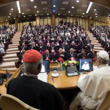 Pope Francis speaks on April 4 to participants at a Vatican conference marking the 50th anniversary of Blessed Paul VI's encyclical on development,