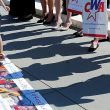 Activists rally outside U.S. Supreme Court in Washington June 26 after the court sided with Trinity Lutheran Church in Columbia, Mo., which sued after being denied a state grant for creating a safer playground (CNS photo/Yuri Gripas, Reuters).