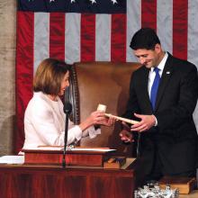 U.S. House Speaker Paul Ryan receives the gavel from House Democratic leader Nancy Pelosi on Jan. 3. (Jonathan Ernst/Reuters)