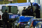 French police remove the bodies of victims after a mass shooting at the Paris offices of Charlie Hebdo, a satirical newspaper, Jan. 7. (CNS/EPA)