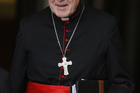 Cardinal Pell of Sydney leaves meeting of cardinals with Pope Francis in synod hall at Vatican. (CNS photo/Paul Haring)