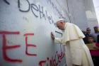 Pope Francis stops in front of the Israeli security wall in Bethlehem, West Bank. (CNS photo/L'Osservatore Romano, pool) 