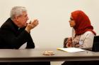 Oblate Father John Crossin is pictured talking with Humaira Basith of the Council of Islamic Organizations of Greater Chicago in this 2012 photo. (CNS photo/Karen Callaway, Catholic New World)